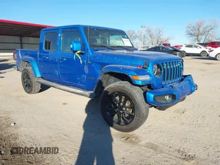 2023 Jeep Gladiator Overland z VIN 1C6HJTFG1PL556842, wystawiony jako IAAI lot #41325860 z przebiegiem 9 737 mil mil oraz . Historia ofert i sprzedaży dostępna na DreamBid. Obrazek 1.