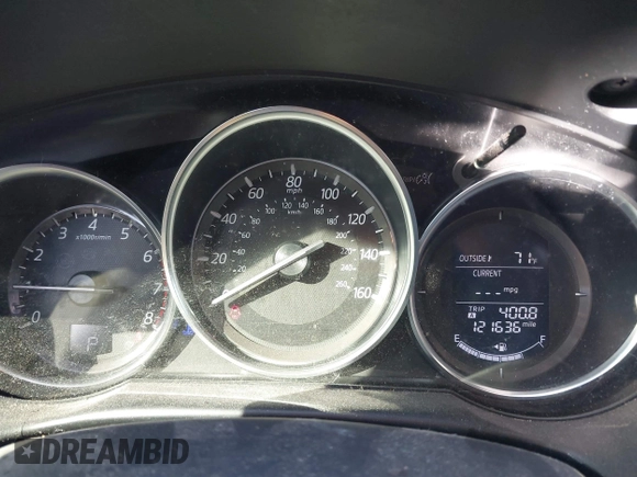2016 Mazda CX-5 Sport with VIN JM3KE2BY3G0641895, listed as a IAAI auction lot 41689138 with 121,636 mi miles and . Bid and sale history available at DreamBid. Image 7.