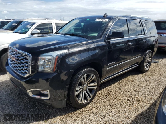 2020 GMC Yukon Denali with VIN 1GKS1CKJXLR181612, listed as a Copart auction lot 74451364 with 52,761 mi miles and Salvage Title. Bid and sale history available at carsss.com. Image 1.