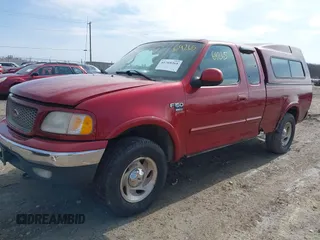 2001 Ford F-150 XL with VIN 1FTRX18L71NA42953, listed as a IAAI auction lot 41769265 with 1 mi miles. Bid and sale history available at carsss.com. Image 2.
