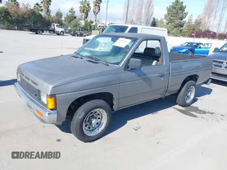 1988 Nissan Hardbody z VIN 1N6ND11S0JC345025, wystawiony jako IAAI lot #41899460 z przebiegiem 132 502 mil mil oraz . Historia ofert i sprzedaży dostępna na DreamBid. Obrazek 2.