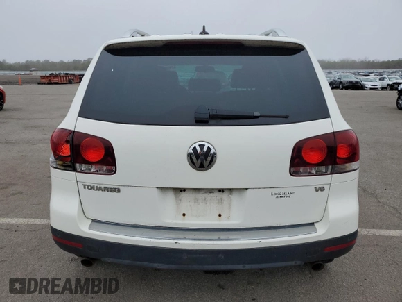 2008 Volkswagen Touareg V6 z VIN WVGBE77L08D043577, wystawiony jako Copart lot #50735775 z przebiegiem Nie podano mil oraz Szkoda całkowita • Salvage title. Historia ofert i sprzedaży dostępna na DreamBid. Obrazek 6.