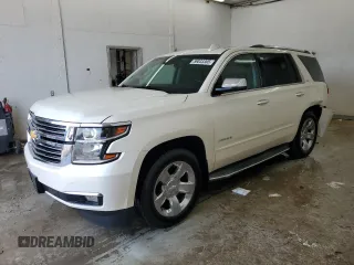 2015 Chevrolet Tahoe LTZ with VIN 1GNSKCKC6FR501532, listed as a Copart auction lot 59033305 with 90,847 mi miles and Salvage title. Bid and sale history available at DreamBid. Image 1.
