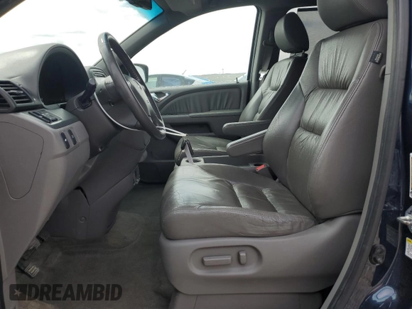 2009 Honda Odyssey EX-L with VIN 5FNRL38629B409446, listed as a Copart auction lot 54736045 with 176,229 mi miles and Salvage Title. Bid and sale history available at DreamBid. Image 7.