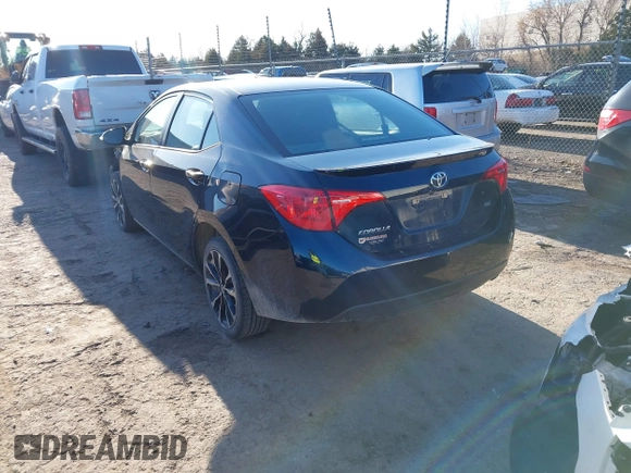 2017 Toyota Corolla L z VIN 5YFBURHE0HP721258, wystawiony jako IAAI lot #41706824 z przebiegiem 158 554 mil mil oraz . Historia ofert i sprzedaży dostępna na DreamBid. Obrazek 3.