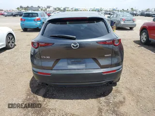 2021 Mazda CX-30 Select with VIN 3MVDMABL5MM210517, listed as a IAAI auction lot 42245033 with 191,303 mi miles and . Bid and sale history available at DreamBid. Image 16.