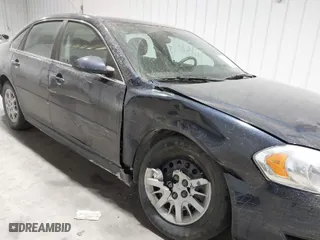 2011 Chevrolet Impala Police Police with VIN 2G1WD5EM2B1165829, listed as a IAAI auction lot 41380558 with 110,695 mi miles. Bid and sale history available at carsss.com. Image 6.