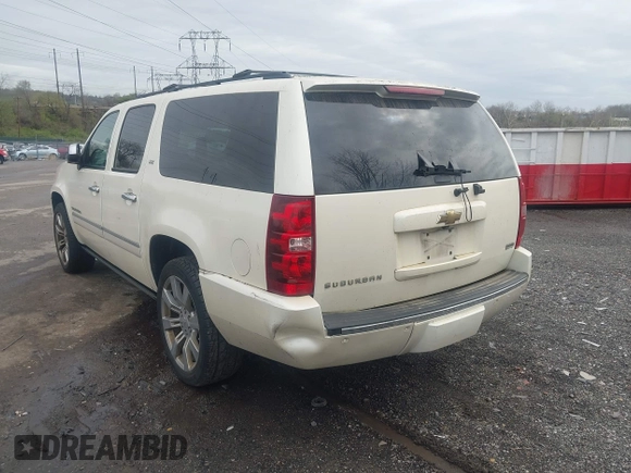 2010 Chevrolet Suburban LTZ with VIN 1GNUKKE35AR129351, listed as a IAAI auction lot 41971625 with 234,487 mi miles. Bid and sale history available at carsss.com. Image 6.