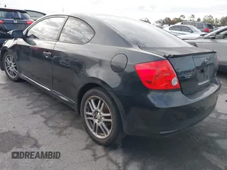 2007 Scion tC Spec with VIN JTKDE167070155986, listed as a IAAI auction lot 42062910 with 198,049 mi miles. Bid and sale history available at carsss.com. Image 3.