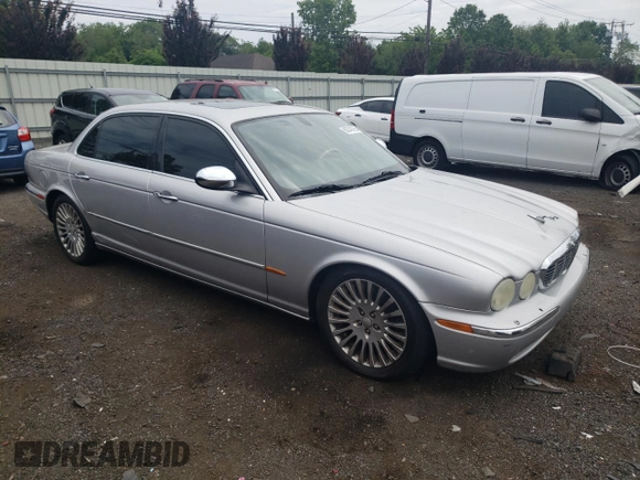 2005 Jaguar XJ Vanden Plas z VIN SAJWA82C15SG37427, wystawiony jako Copart lot #60749795 z przebiegiem 90 122 mil mil oraz Czysty tytuł • Clean title. Historia ofert i sprzedaży dostępna na DreamBid. Obrazek 4.
