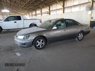 1997 Lexus ES 300 z VIN JT8BF22G1V0082842, wystawiony jako Copart lot #60787735 z przebiegiem 307 784 mil mil oraz Szkoda całkowita • Salvage title. Historia ofert i sprzedaży dostępna na DreamBid. Obrazek 1.