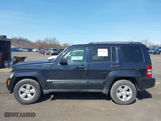 2011 Jeep Liberty Sport 70th Anniversary with VIN 1J4PN2GKXBW539030, listed as a IAAI auction lot 41913633 with 115,605 mi miles. Bid and sale history available at carsss.com. Image 14.