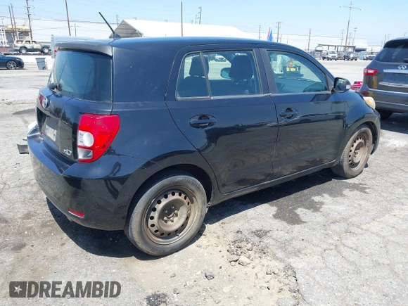2008 Scion xD with VIN JTKKU10438J014799, listed as a IAAI auction lot 42107563 with 215,136 mi miles. Bid and sale history available at carsss.com. Image 4.
