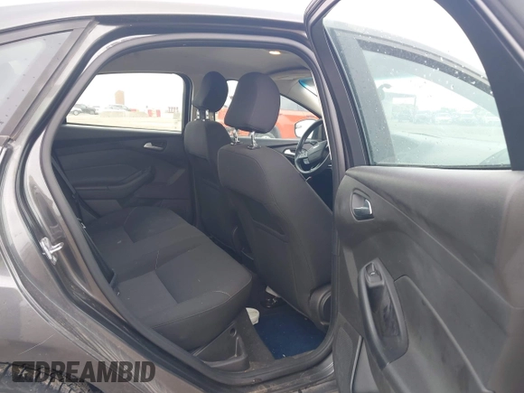 2017 Ford Focus SE z VIN 1FADP3F21HL205009, wystawiony jako IAAI lot #42305641 z przebiegiem 75 160 mil mil oraz . Historia ofert i sprzedaży dostępna na DreamBid. Obrazek 8.