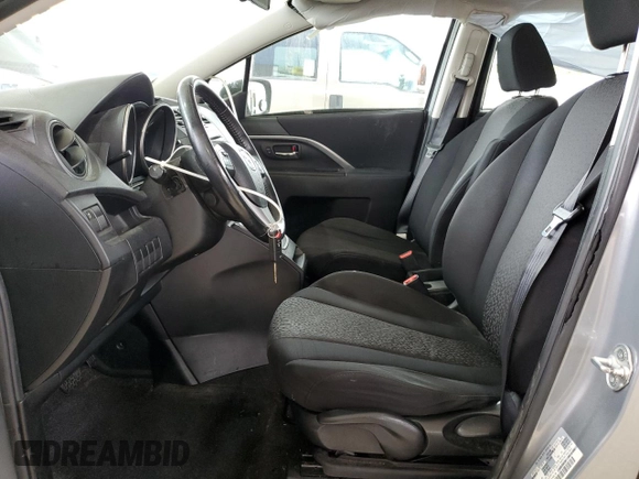2012 Mazda 5 Touring z VIN JM1CW2CL6C0143536, wystawiony jako Copart lot #57579915 z przebiegiem 148 191 mil mil oraz Szkoda całkowita • Salvage title. Historia ofert i sprzedaży dostępna na DreamBid. Obrazek 7.