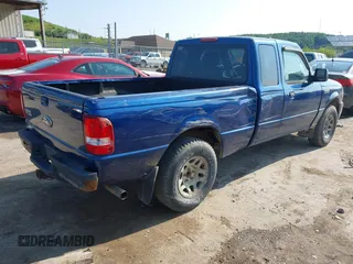 2011 Ford Ranger XLT with VIN 1FTLR4FE2BPA41799, listed as a IAAI auction lot 42390457 with 154,477 mi miles and . Bid and sale history available at DreamBid. Image 4.