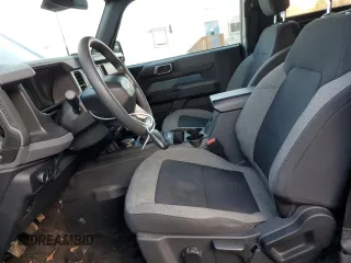 2022 Ford Bronco z VIN 1FMDE5AH6NLB71051, wystawiony jako Copart lot #77580794 z przebiegiem 20 904 mil mil oraz Szkoda całkowita • Salvage title. Historia ofert i sprzedaży dostępna na DreamBid. Obrazek 7.