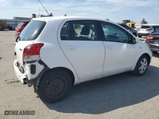 2009 Toyota Yaris with VIN JTDKT903495224256, listed as a Copart auction lot 50065565 with 164,473 mi miles and Salvage Title. Bid and sale history available at carsss.com. Image 3.