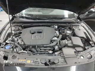 2024 Mazda 3 S Select Sport z VIN 3MZBPABMXRM432614, wystawiony jako IAAI lot #41654313 z przebiegiem Nie podano mil oraz . Historia ofert i sprzedaży dostępna na DreamBid. Obrazek 10.