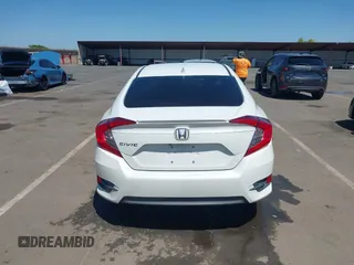 2016 Honda Civic EX-L z VIN 2HGFC1F83GH636374, wystawiony jako IAAI lot #42328432 z przebiegiem 130 738 mil mil oraz . Historia ofert i sprzedaży dostępna na DreamBid. Obrazek 16.