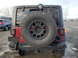 2013 Jeep Wrangler Rubicon с VIN 1C4HJWCG8DL520639, выставлен на аукционе Copart как лот 42458815 с пробегом 37 934 миль миль и Списание • Salvage title. История ставок и продаж доступна на DreamBid. Изображение 6.