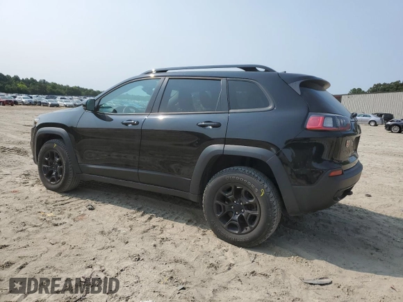 2022 Jeep Cherokee X with VIN 1C4PJMCX1ND526231, listed as a Copart auction lot 57551585 with 77,157 mi miles and Salvage title. Bid and sale history available at DreamBid. Image 2.