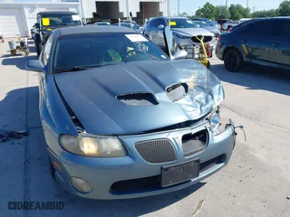2006 Pontiac GTO with VIN 6G2VX12U66L811744, listed as a IAAI auction lot 41988486 with 81,893 mi miles. Bid and sale history available at carsss.com. Image 12.