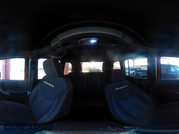 2014 Jeep Wrangler Unlimited Sahara z VIN 1C4BJWEG1EL209431, wystawiony jako IAAI lot #42325022 z przebiegiem 64 529 mil mil oraz . Historia ofert i sprzedaży dostępna na DreamBid. Obrazek 18.