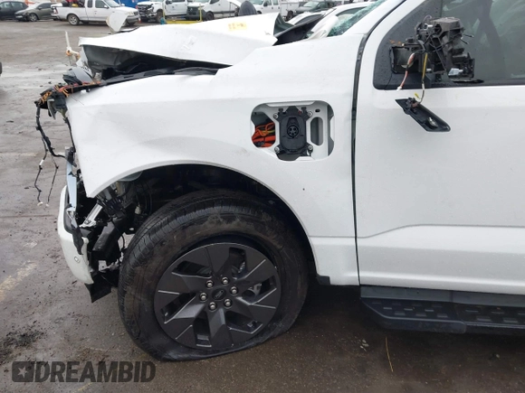 2023 Ford F-150 Lightning Pro with VIN 1FT6W1EV8PWG05765, listed as a IAAI auction lot 41461450 with Not Provided miles and . Bid and sale history available at DreamBid. Image 12.