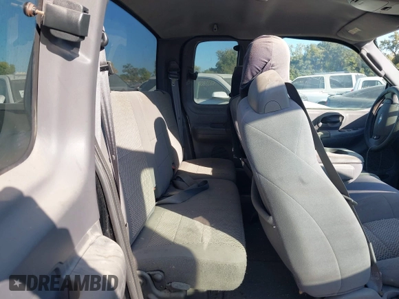 2003 Ford F-150 XL with VIN 1FTRX07W63KD30974, listed as a IAAI auction lot 40609687 with 208,378 mi miles and . Bid and sale history available at DreamBid. Image 8.