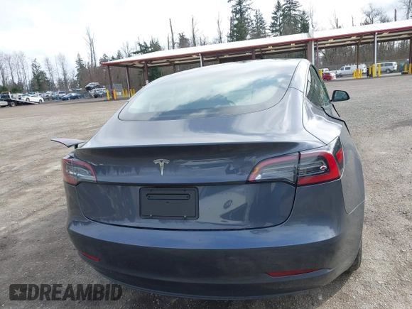 2023 Tesla Model 3 with VIN 5YJ3E1EA2PF623217, listed as a IAAI auction lot 41701413 with 21,246 mi miles and . Bid and sale history available at DreamBid. Image 17.