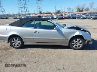 2003 Mercedes-Benz CLK 320 z VIN WDBLK65GX3T143863, wystawiony jako IAAI lot #41704225 z przebiegiem Nie podano mil oraz . Historia ofert i sprzedaży dostępna na DreamBid. Obrazek 14.