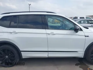 2021 Volkswagen Tiguan SE with VIN 3VV3B7AX9MM003432, listed as a IAAI auction lot 41914477 with 64,530 mi miles and . Bid and sale history available at DreamBid. Image 14.