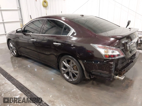 2014 Nissan Maxima SV z VIN 1N4AA5AP5EC910605, wystawiony jako IAAI lot #42082685 z przebiegiem 83 628 mil mil oraz . Historia ofert i sprzedaży dostępna na DreamBid. Obrazek 3.