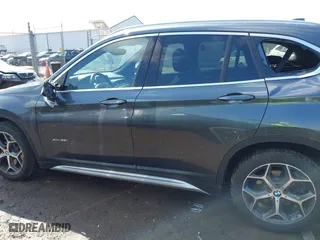 2016 BMW X1 xDrive28i with VIN WBXHT3C35GP886094, listed as a IAAI auction lot 42009639 with 61,739 mi miles. Bid and sale history available at carsss.com. Image 14.