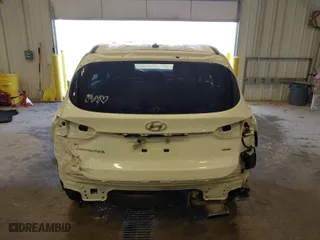 2019 Hyundai Santa Fe SE with VIN 5NMS2CAD4KH120957, listed as a IAAI auction lot 41937085 with 101,584 mi miles. Bid and sale history available at carsss.com. Image 17.