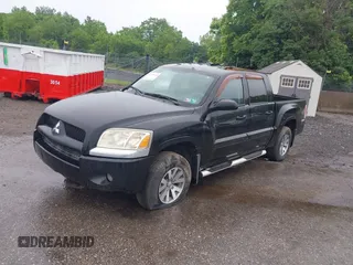 2007 Mitsubishi Raider LS z VIN 1Z7HT28K77S161721, wystawiony jako IAAI lot #42371688 z przebiegiem 130 815 mil mil oraz . Historia ofert i sprzedaży dostępna na DreamBid. Obrazek 2.