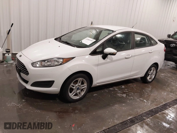 2017 Ford Fiesta SE with VIN 3FADP4BJ5HM156141, listed as a IAAI auction lot 42085359 with 52,015 mi miles and . Bid and sale history available at DreamBid. Image 2.