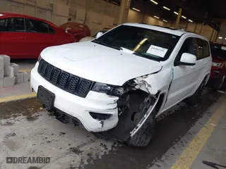 2019 Jeep Grand Cherokee Laredo E with VIN 1C4RJFAG1KC818289, listed as a IAAI auction lot 41602541 with 59,356 mi miles. Bid and sale history available at carsss.com. Image 23.