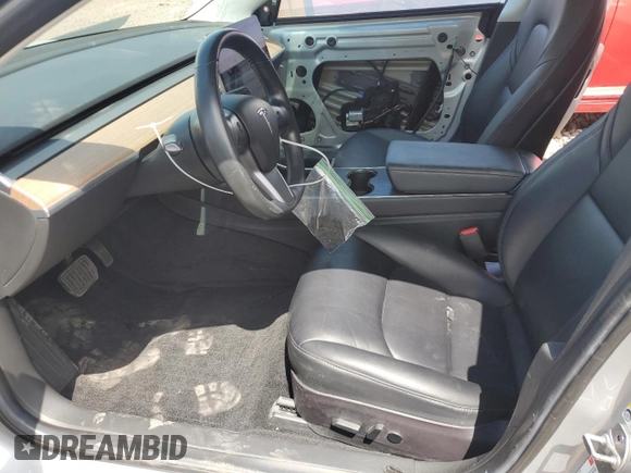 2018 Tesla Model 3 Long Range Battery with VIN 5YJ3E1EA2JF016631, listed as a Copart auction lot 55527095 with 129,547 mi miles and Salvage Title. Bid and sale history available at DreamBid. Image 7.