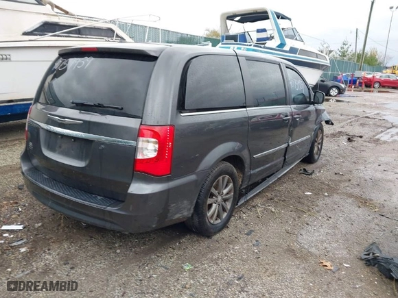 2015 Chrysler Town & Country S with VIN 2C4RC1HG6FR573991, listed as a IAAI auction lot 40759959 with NaN miles. Bid and sale history available at carsss.com. Image 4.
