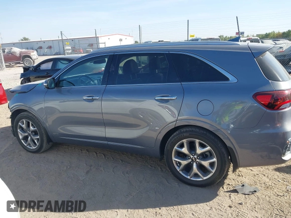 2020 Kia Sorento SX z VIN 5XYPKDA58LG686586, wystawiony jako IAAI lot #40502030 z przebiegiem 76 546 mil mil oraz . Historia ofert i sprzedaży dostępna na DreamBid. Obrazek 14.