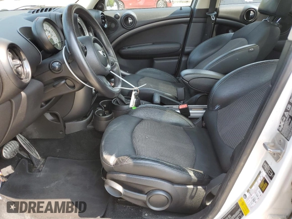 2014 MINI Countryman S with VIN WMWZC5C5XEWP37128, listed as a Copart auction lot 59549885 with 84,121 mi miles and Salvage title. Bid and sale history available at DreamBid. Image 7.