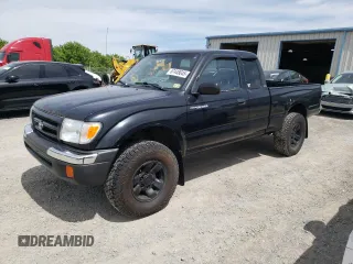 1999 Toyota Tacoma with VIN 4TAWM72N7XZ571633, listed as a Copart auction lot 57448045 with 238,385 mi miles and Clean title. Bid and sale history available at DreamBid. Image 1.