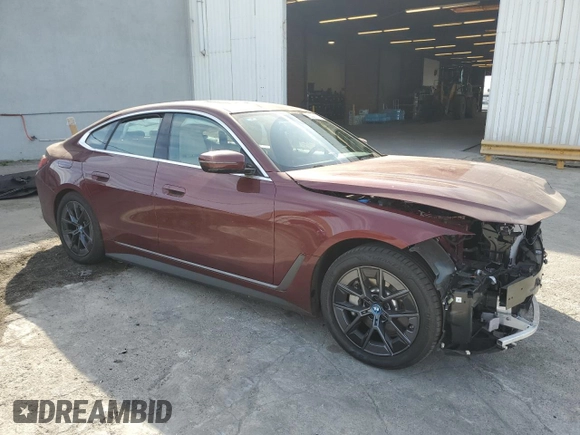 2024 BMW i4 eDrive35 with VIN WBY43AW00RFS13061, listed as a Copart auction lot 85991874 with 5,732 mi miles and Salvage Title. Bid and sale history available at carsss.com. Image 4.