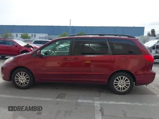 2009 Toyota Sienna XLE with VIN 5TDZK22C29S261516, listed as a IAAI auction lot 41831006 with 147,667 mi miles. Bid and sale history available at carsss.com. Image 14.