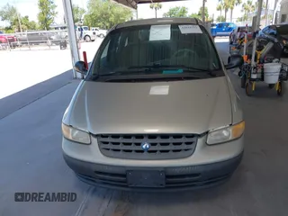 1999 Plymouth Voyager z VIN 2P4FP25B8XR470543, wystawiony jako IAAI lot #42043722 z przebiegiem 175 834 mil mil oraz . Historia ofert i sprzedaży dostępna na DreamBid. Obrazek 12.