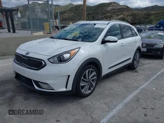 2017 Kia Niro Touring with VIN KNDCE3LC3H5070998, listed as a IAAI auction lot 41448651 with 54,760 mi miles. Bid and sale history available at carsss.com. Image 2.