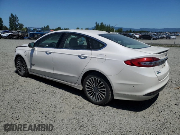 2017 Ford Fusion Titanium with VIN 3FA6P0SU6HR414181, listed as a Copart auction lot 59240095 with 57,224 mi miles and Salvage title. Bid and sale history available at DreamBid. Image 2.