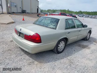 2004 Mercury Grand Marquis LS Premium with VIN 2MEFM75W14X649140, listed as a IAAI auction lot 42095663 with 88,896 mi miles. Bid and sale history available at carsss.com. Image 4.